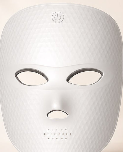 Close-up of the REVELIVA LIGHT MASK forehead touch control